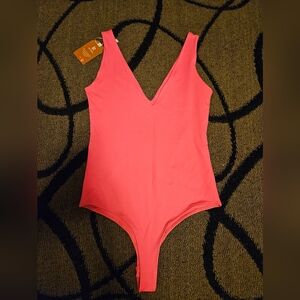 Hot pink bodysuit